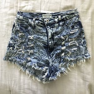 Acid washed and distressed booty shorts